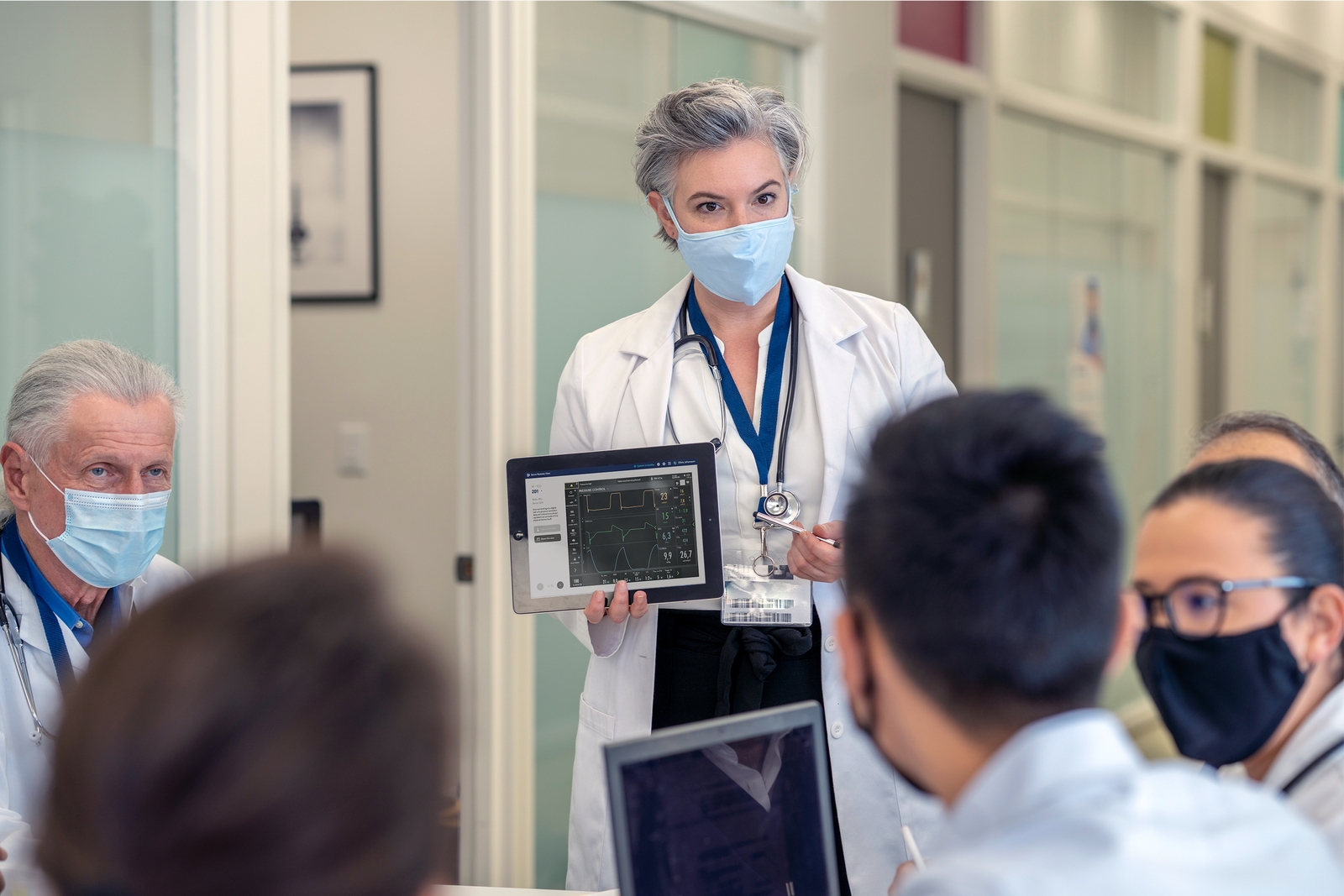 Doctor presenting patient's ventilation data